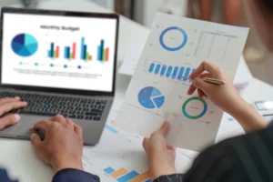 Medical billing and coding professional reviewing healthcare revenue reports