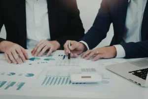 Medical billing team managing Medicaid eligibility and payer mix changes